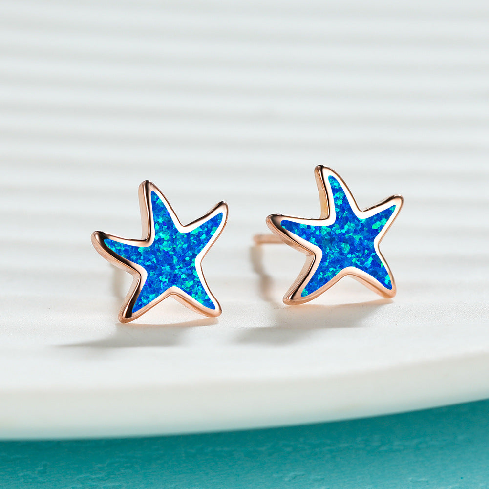 Marina - Boucles d'oreilles étoile de mer en opale bleue