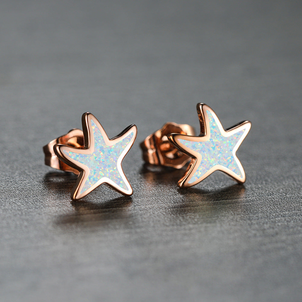 Marina - Boucles d'oreilles étoile de mer en opale bleue