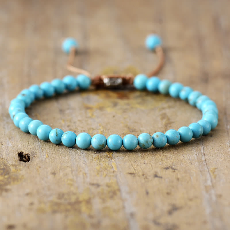 Aisha - Bracelet tressé réglable en perles de pierres naturelles