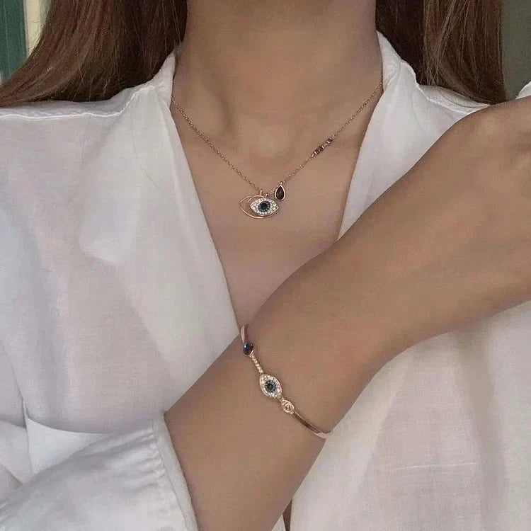 Amira - Set collier et bracelet mauvais œil en or rose