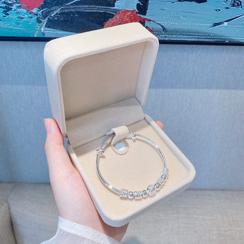 Bracelet en argent 925 perles porte-bonheur réglable
