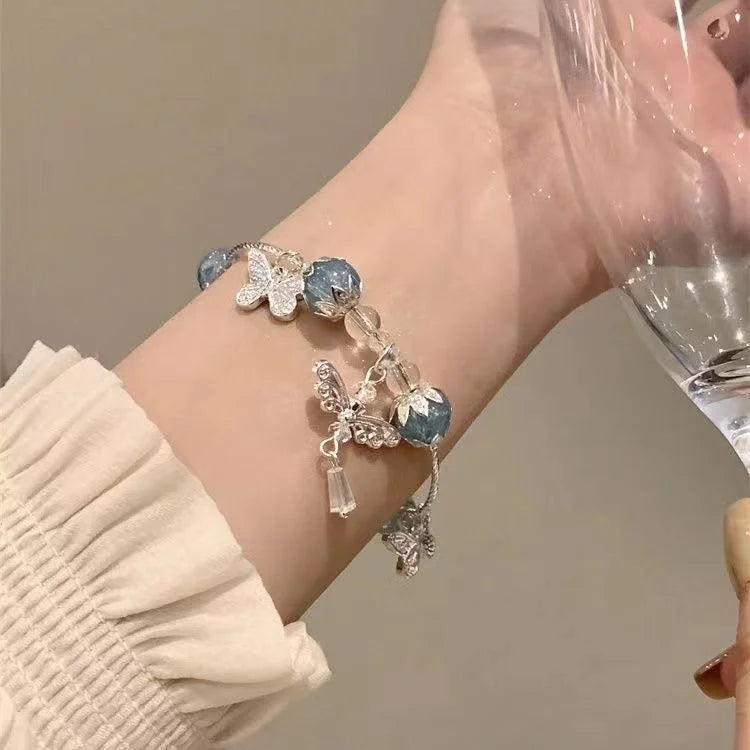 Lila - Bracelet papillon bleu céleste à motif floral