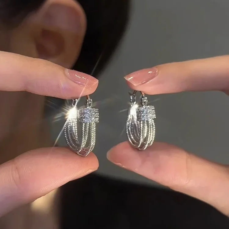 Aria - Boucles géométriques multicouches au style audacieux