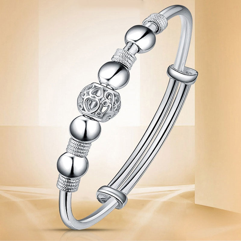 Bracelet en argent 925 perles porte-bonheur réglable