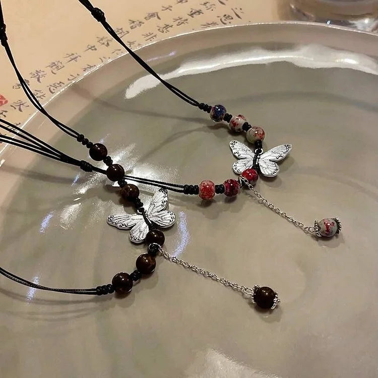 Aurora - Collier papillon et perles élégance enchanteresse