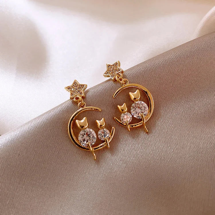Feline - Boucles d'oreilles chat dorées avec zircones