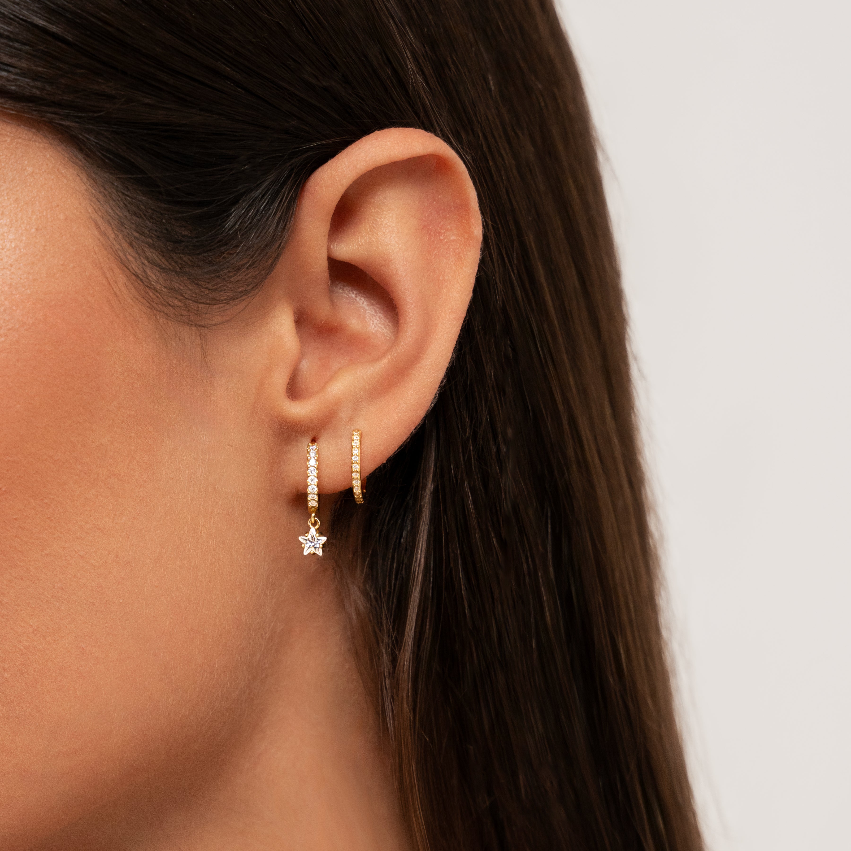 Lyra - Boucles d'oreilles étoile pendantes à la zircone magiques