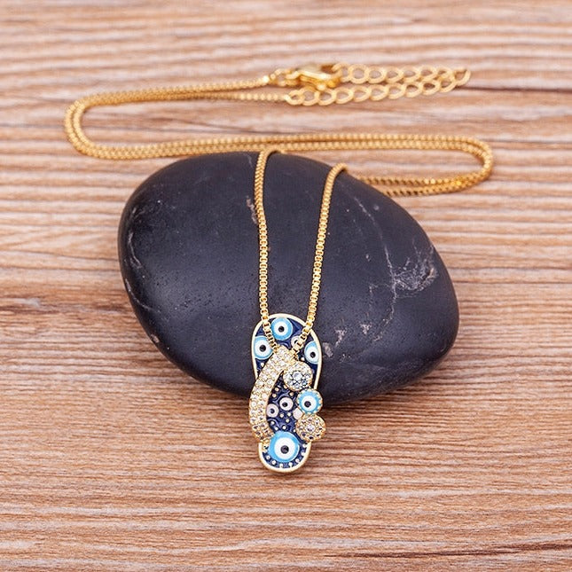 Selma - Collier doré pendentif tong et mauvais œil