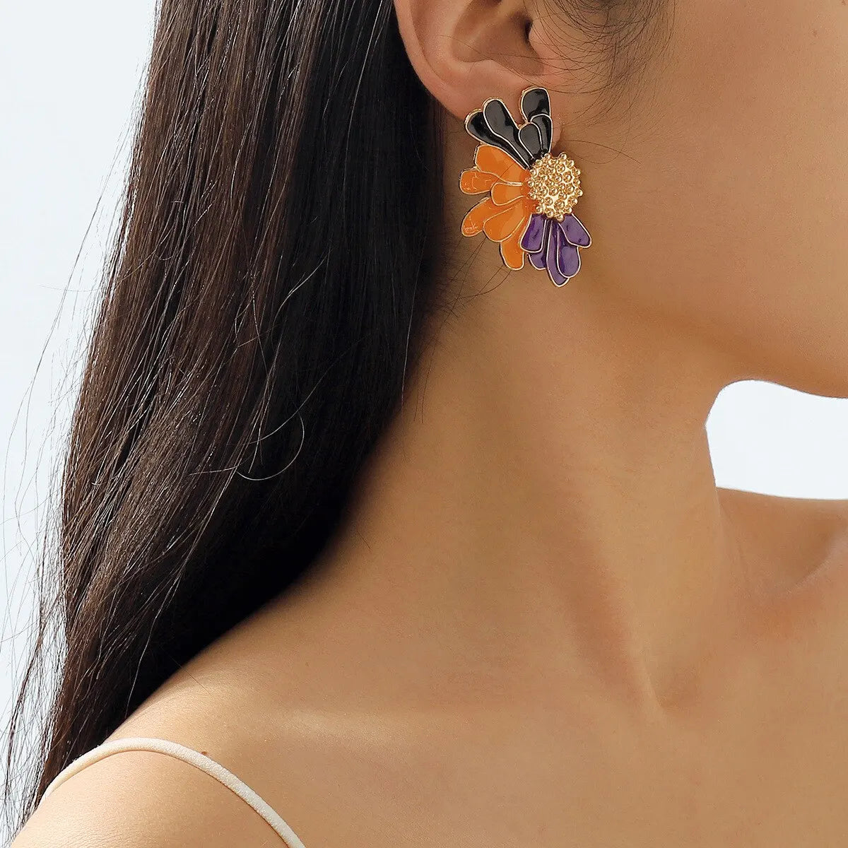 BloomGaze - Boucles d'oreilles fleurs dorées statement