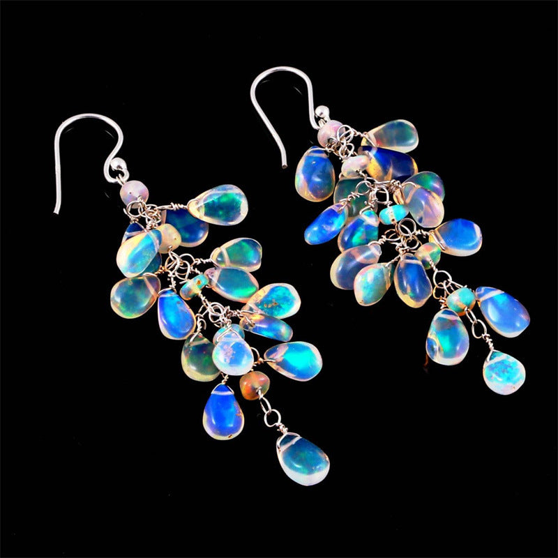 Jante - Boucles d'oreilles pierre de lune lumière nocturne