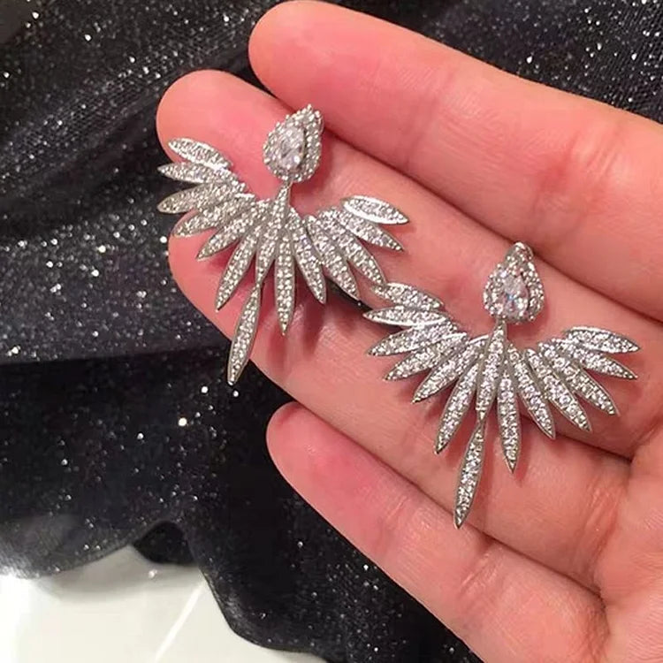 Celeste - Clous d'oreilles ailes d'ange en argent S925