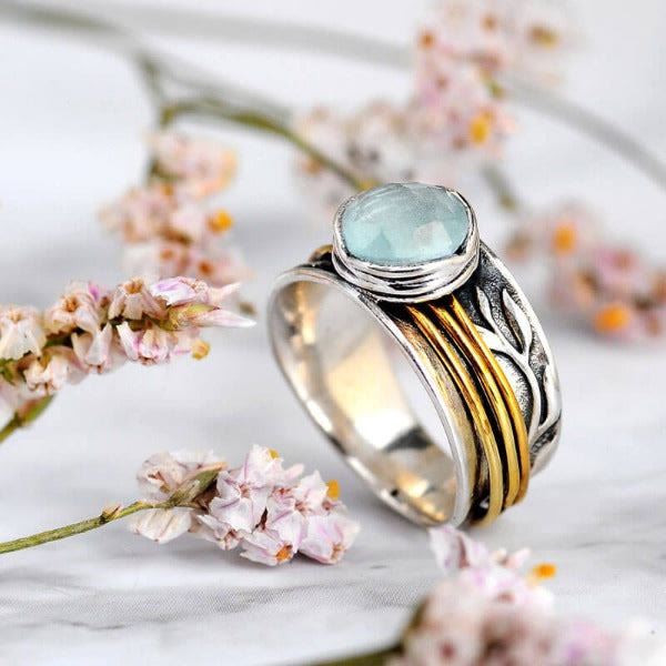Selene - Bague spinner aigue-marine envoûtante
