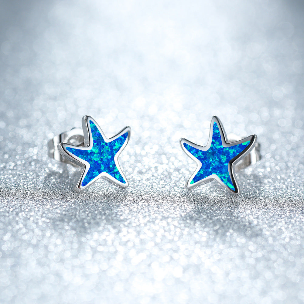 Marina - Boucles d'oreilles étoile de mer en opale bleue