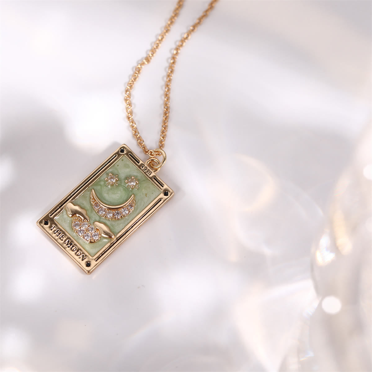 Amara - Collier pendentif tarot doré en zircone
