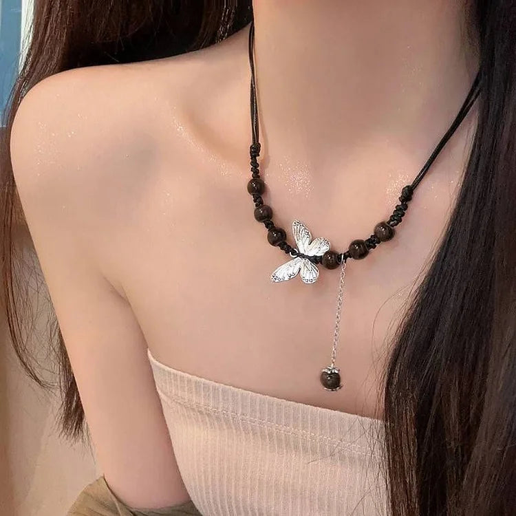 Aurora - Collier papillon et perles élégance enchanteresse