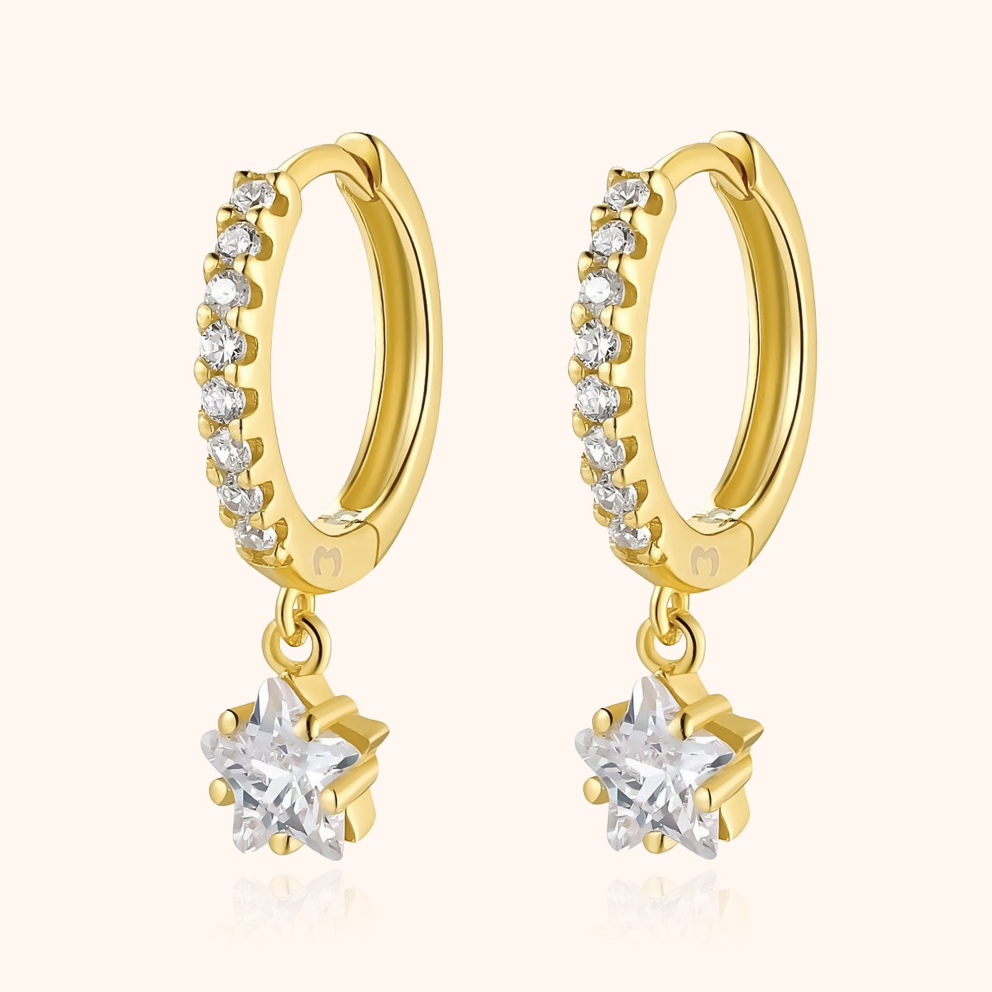 Lyra - Boucles d'oreilles étoile pendantes à la zircone magiques
