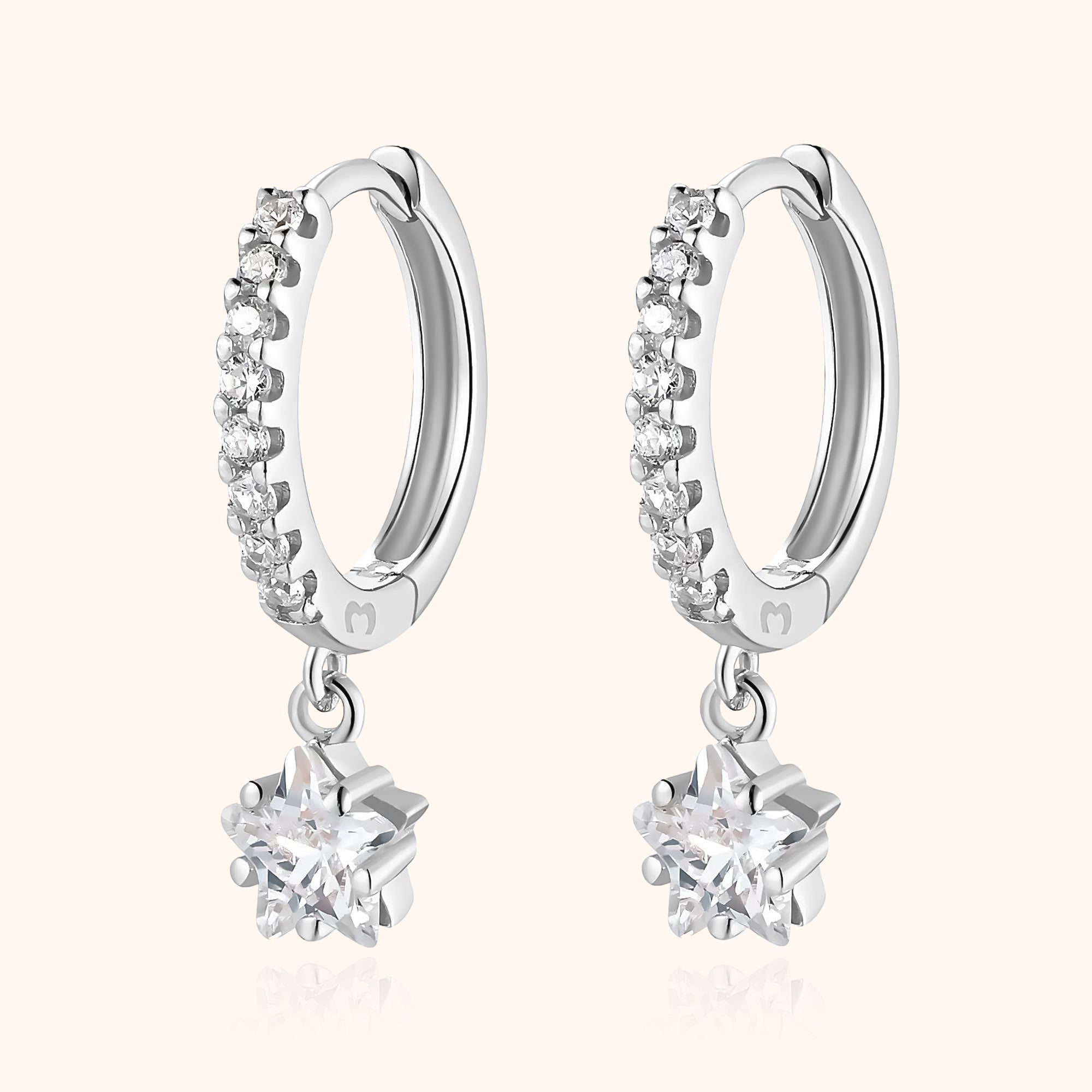 Lyra - Boucles d'oreilles étoile pendantes à la zircone magiques