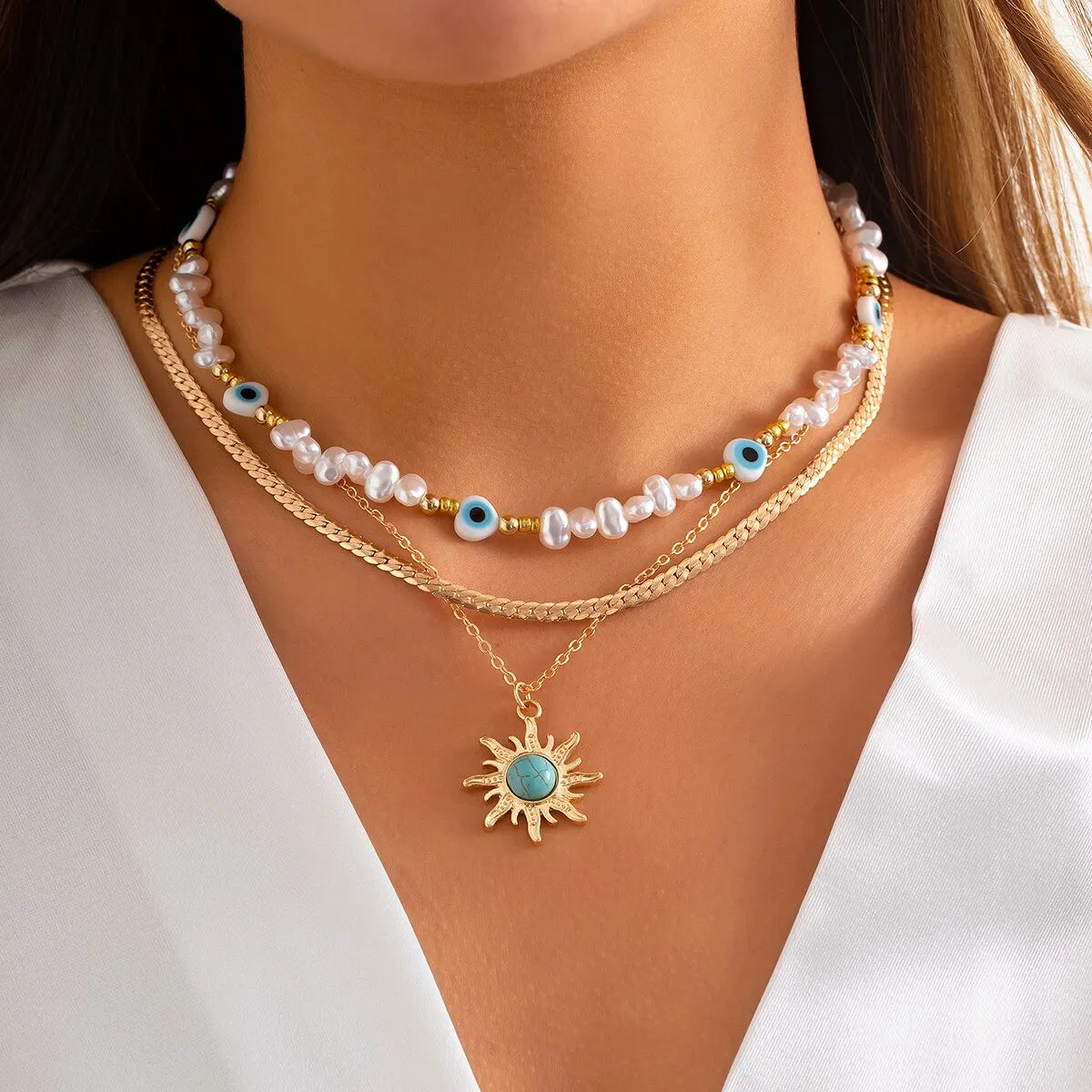EthnoCharm - Set de colliers tournesol et mauvais œil