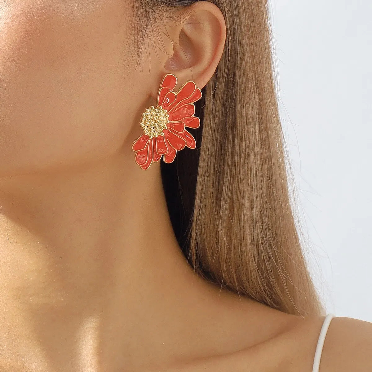 BloomGaze - Boucles d'oreilles fleurs dorées statement