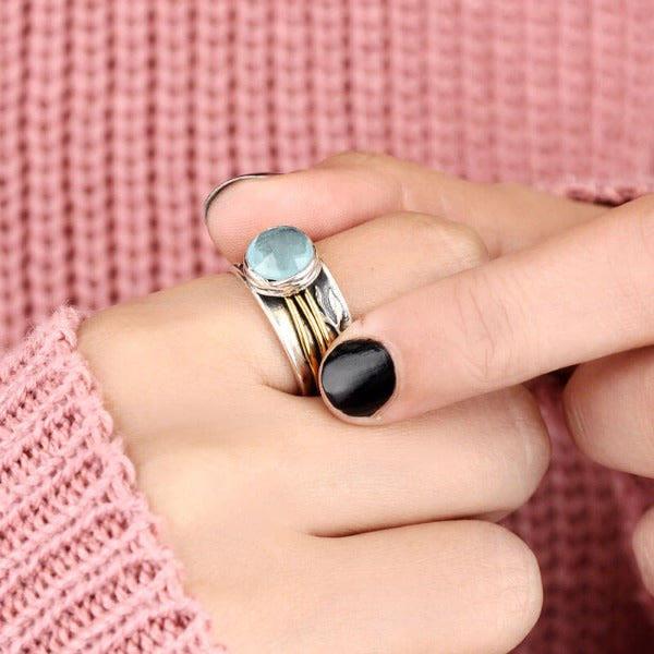 Selene - Bague spinner aigue-marine envoûtante