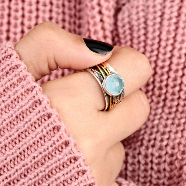 Selene - Bague spinner aigue-marine envoûtante