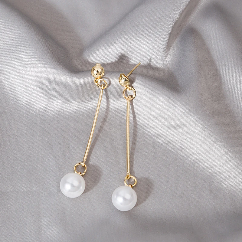 Selena - Boucles d'oreilles pendantes luxe avec perles