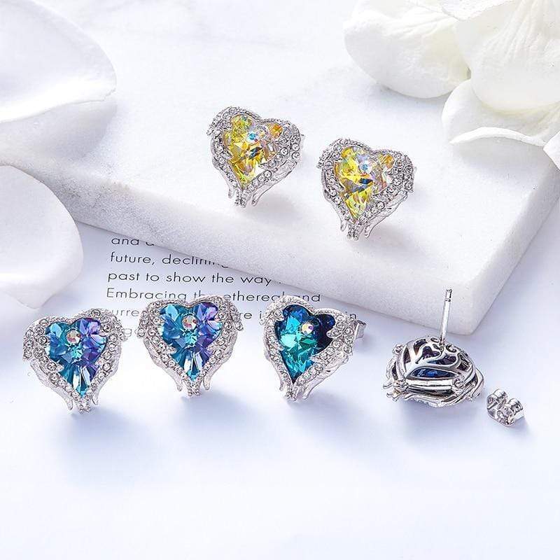Celina - Boucles d'oreilles aile d'ange argentées